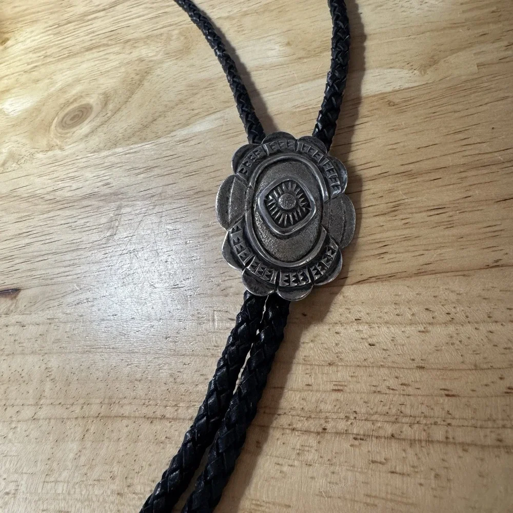 Vintage Southwestern Sun Bolo Tie JS Marked Silver‎ Concho Leather Cord Western
